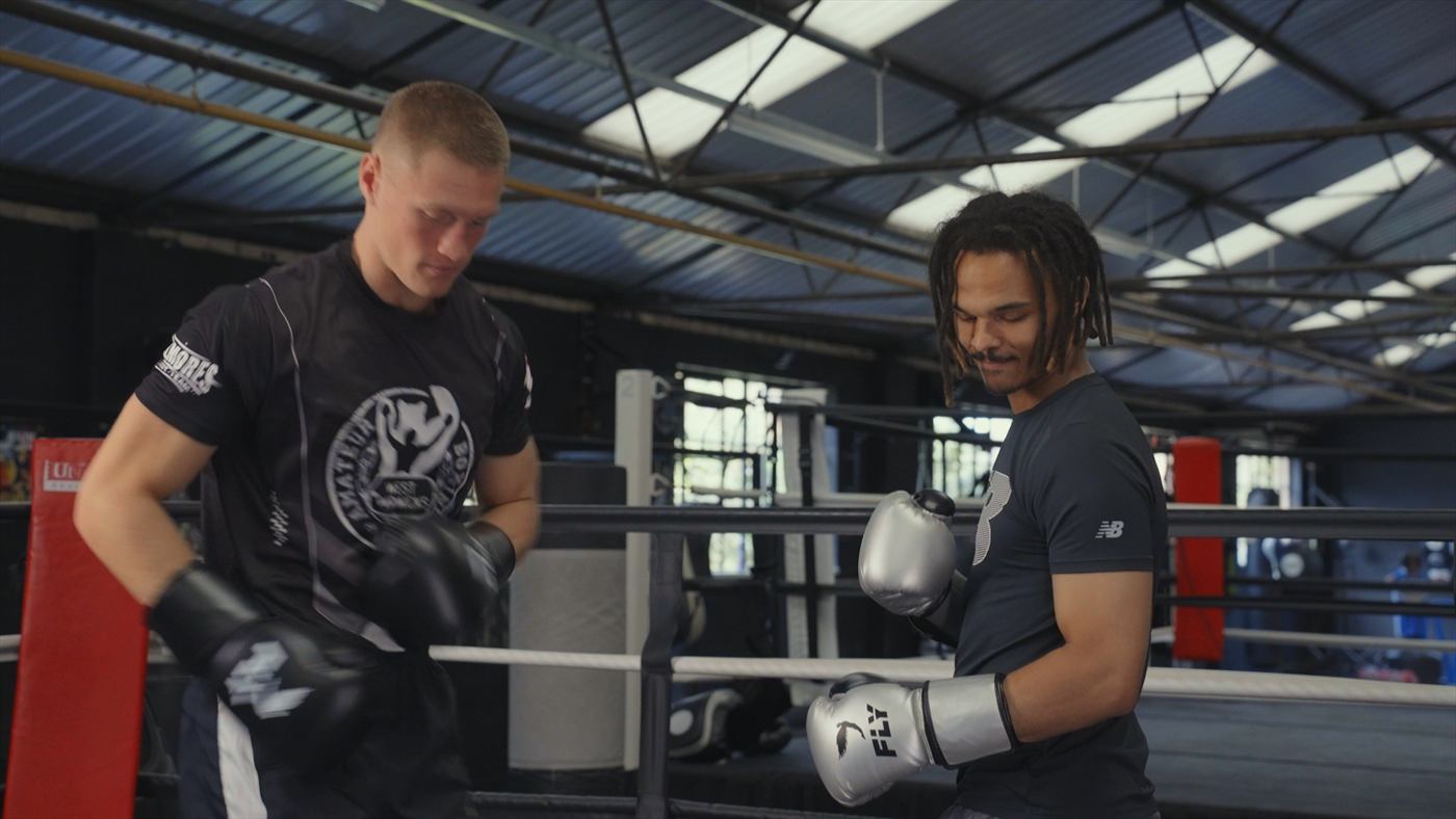 Two boxers in a gym ring during an Oracle Boxing shoot